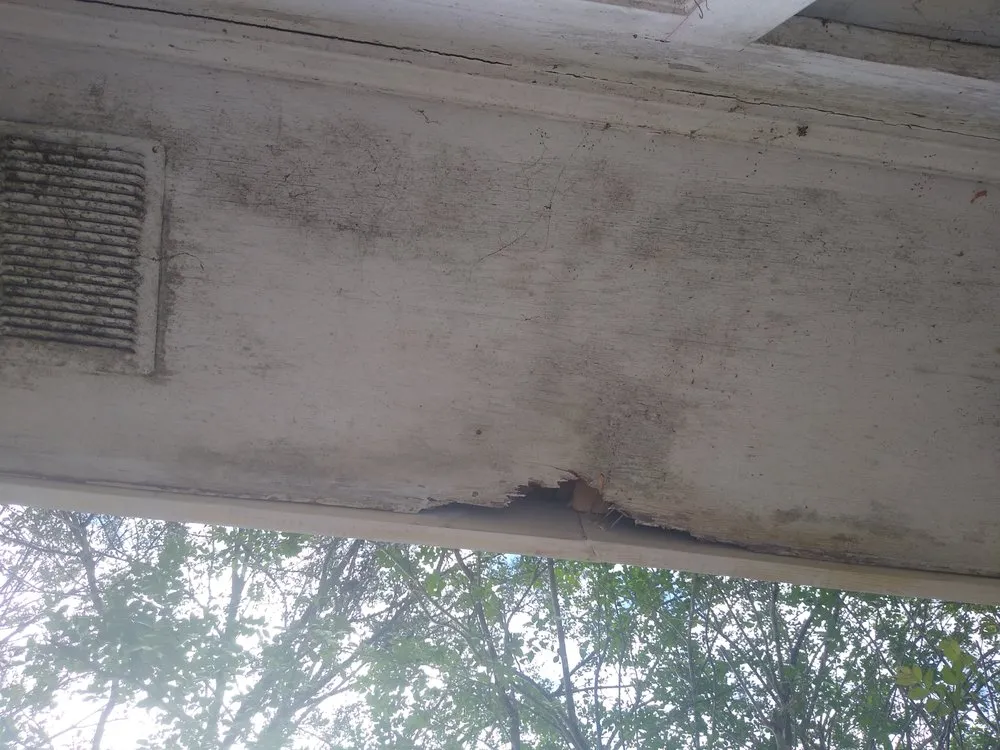 Slide of Tadlock Roofing