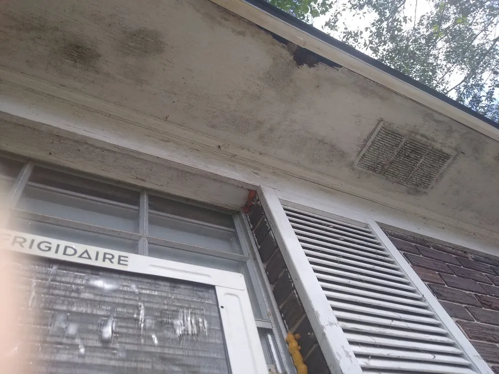 Slide of Tadlock Roofing