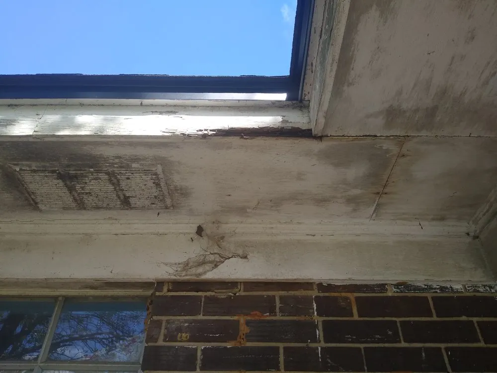 Slide of Tadlock Roofing