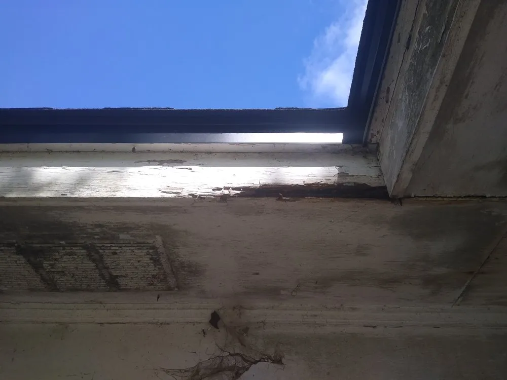 Slide of Tadlock Roofing