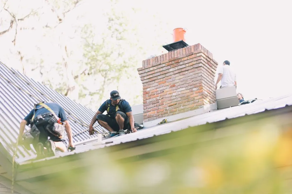 Slide of Tadlock Roofing