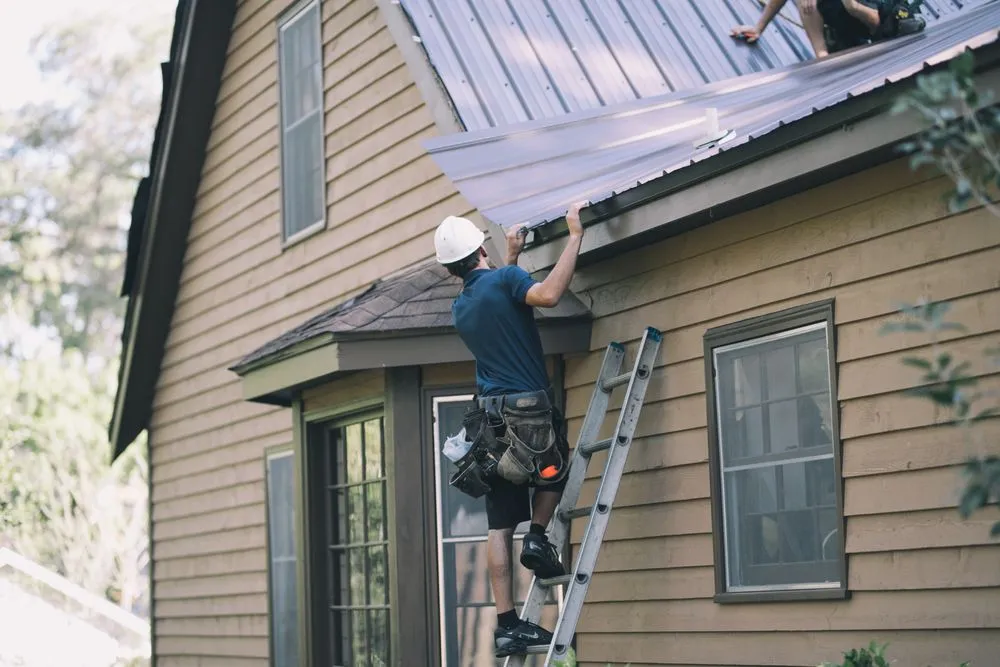 Slide of Tadlock Roofing