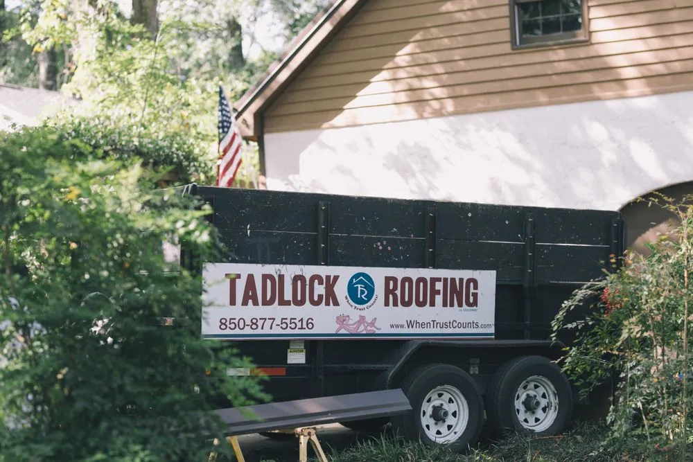Slide of Tadlock Roofing