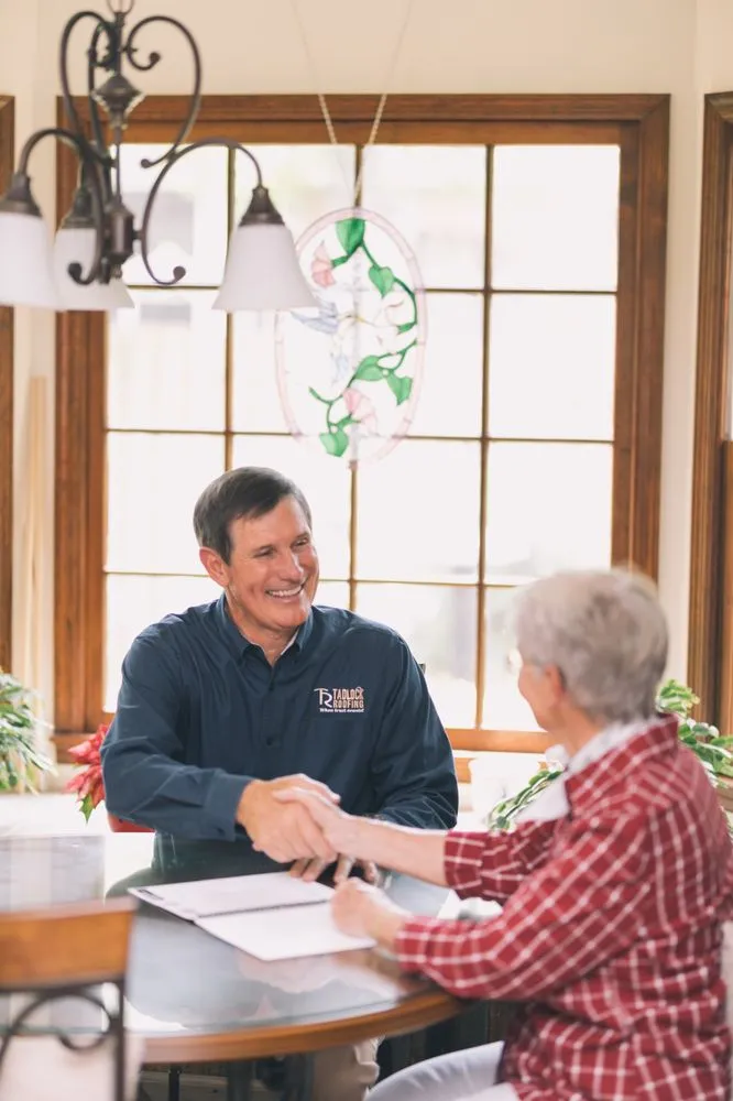 Slide of Tadlock Roofing
