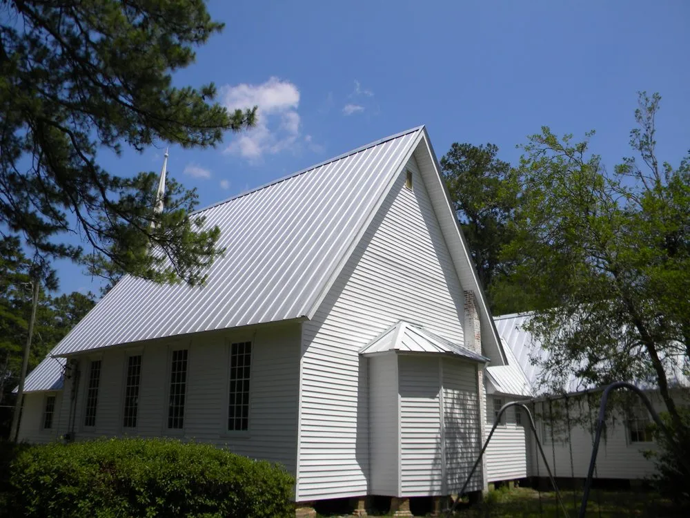 Slide of Tadlock Roofing