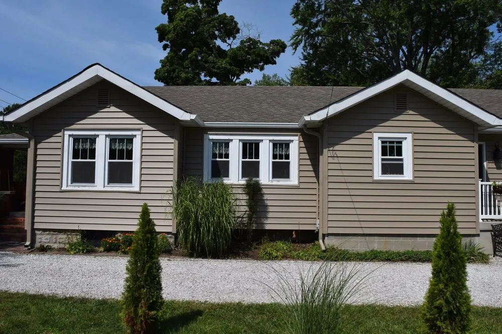 Slide of TAG Exteriors