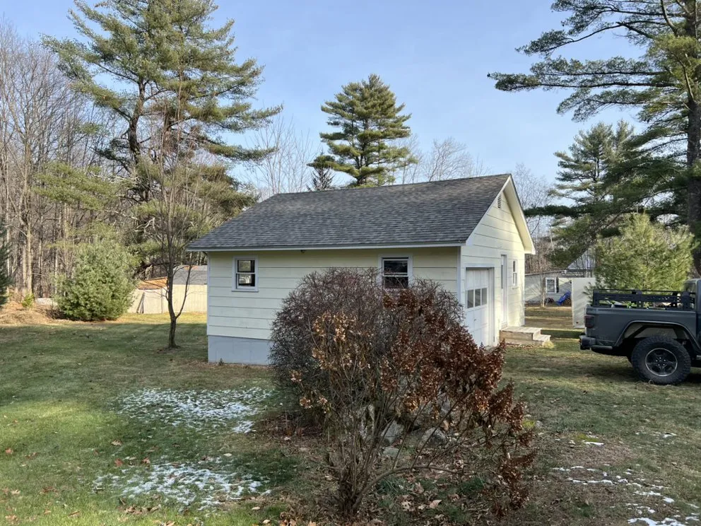 Slide of Tall Pine Roofing
