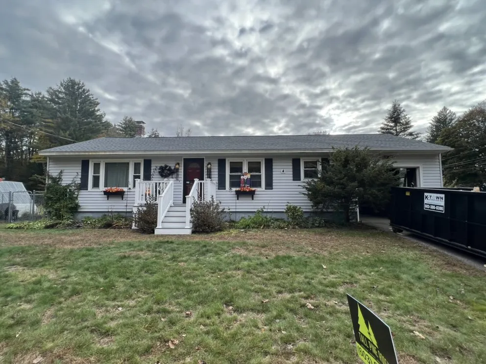 Slide of Tall Pine Roofing