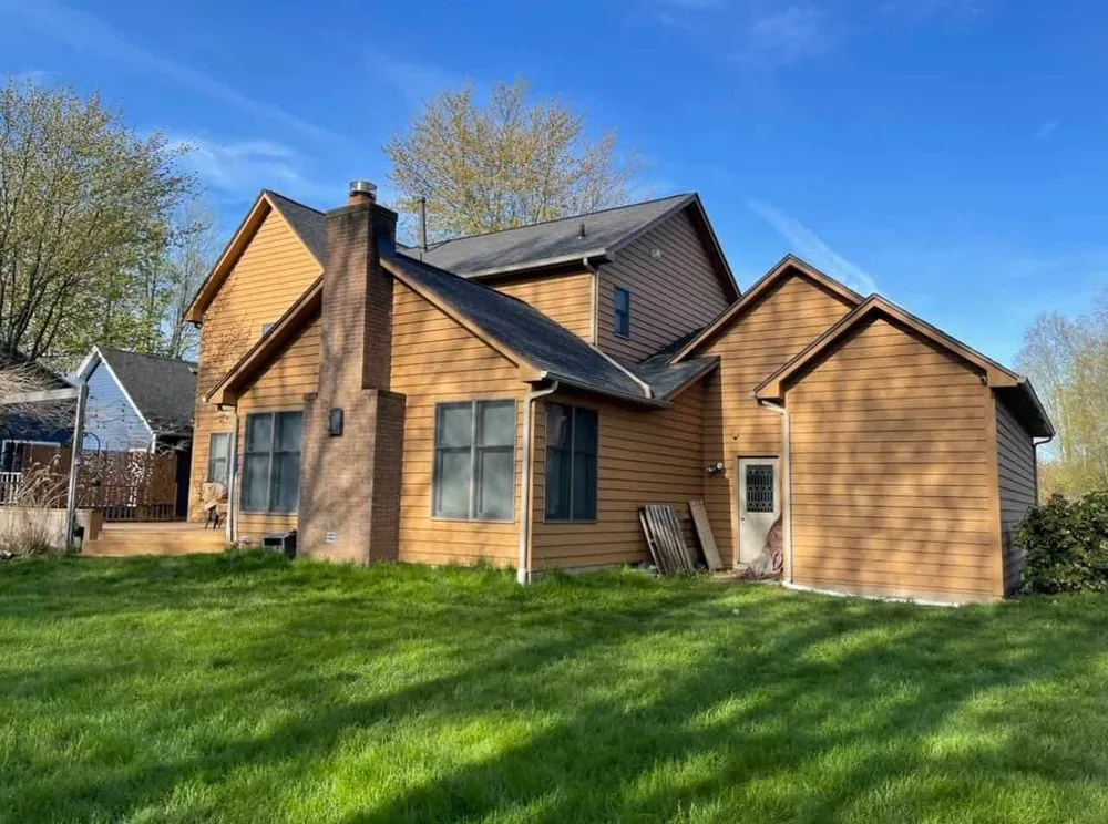Slide of Tall Pines Roofing