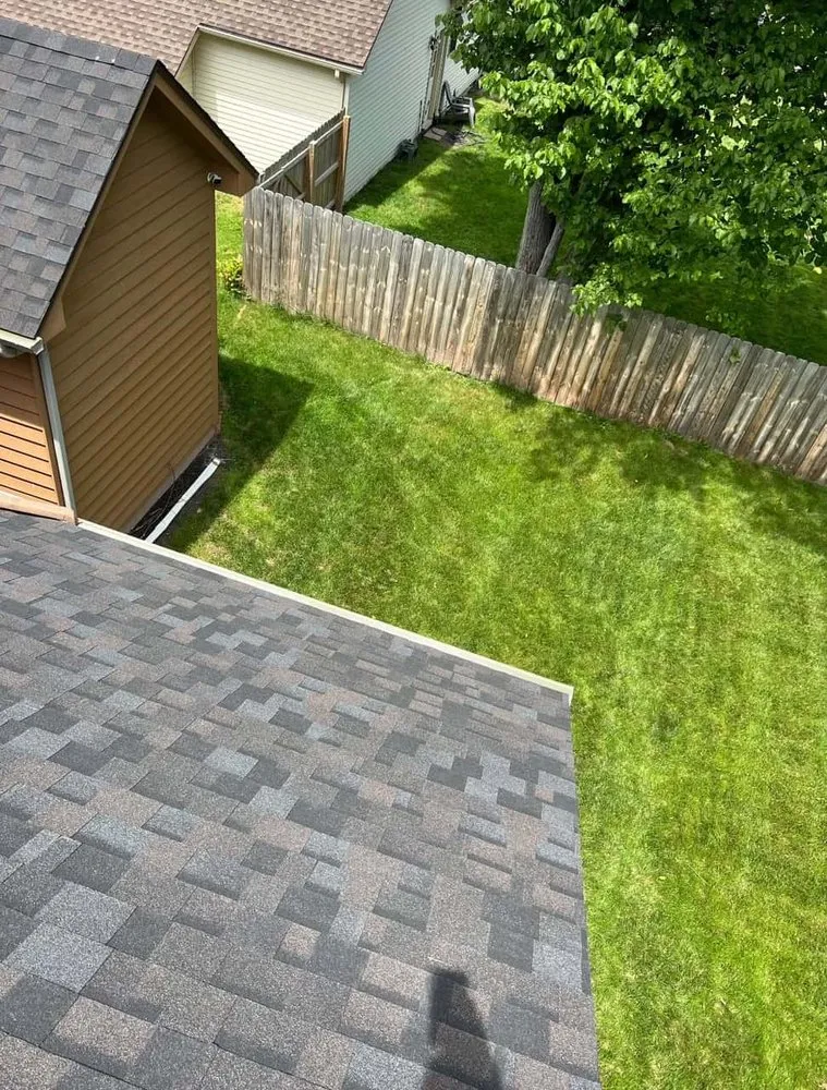 Slide of Tall Pines Roofing