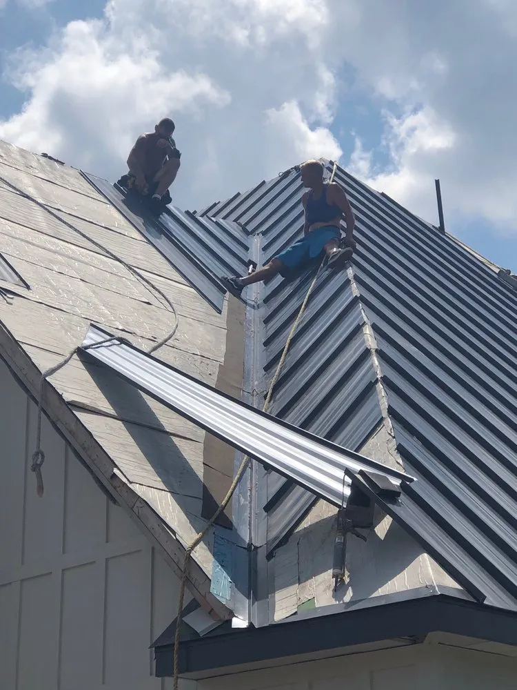 Slide of Tallen Roofing