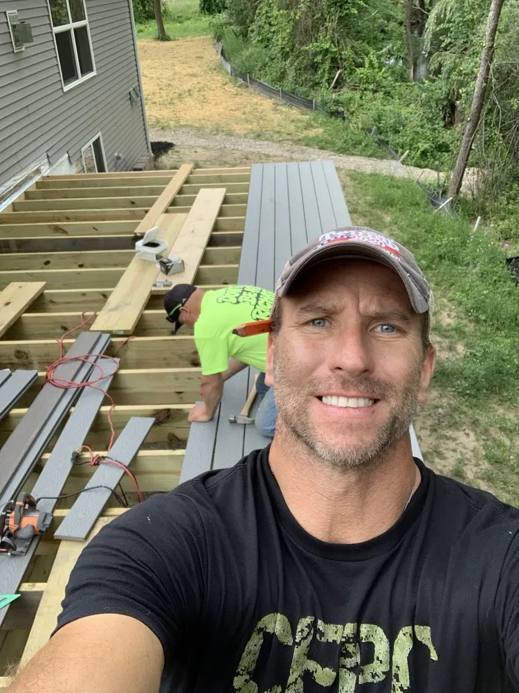 Slide of Tampa Roof Repair