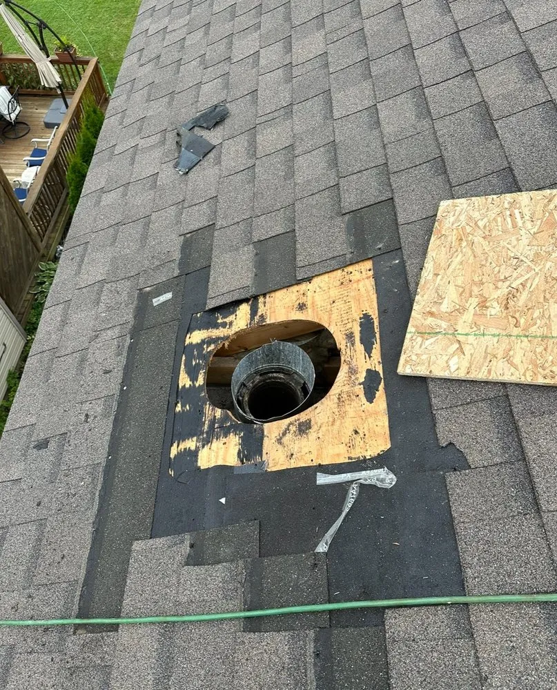 Slide of Tampa Roof Repair