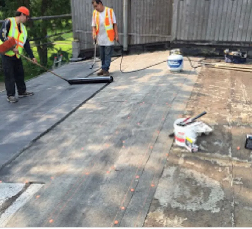 Slide of Tan Roofing And Masonry