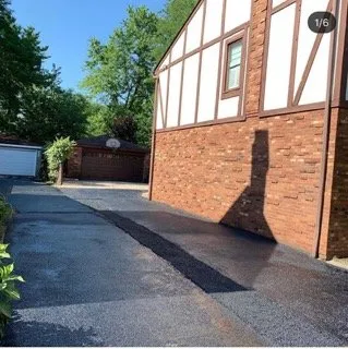 Slide of Tan Roofing And Masonry