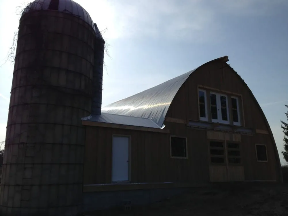 Slide of Tanbry Roofing