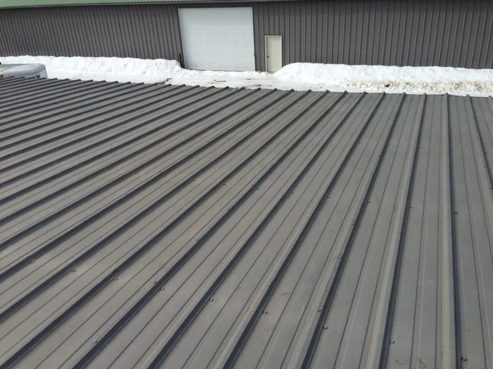 Slide of Tanbry Roofing