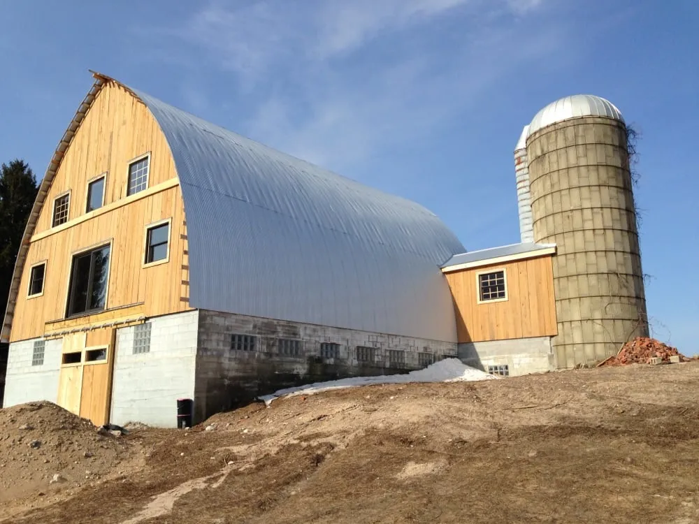 Slide of Tanbry Roofing