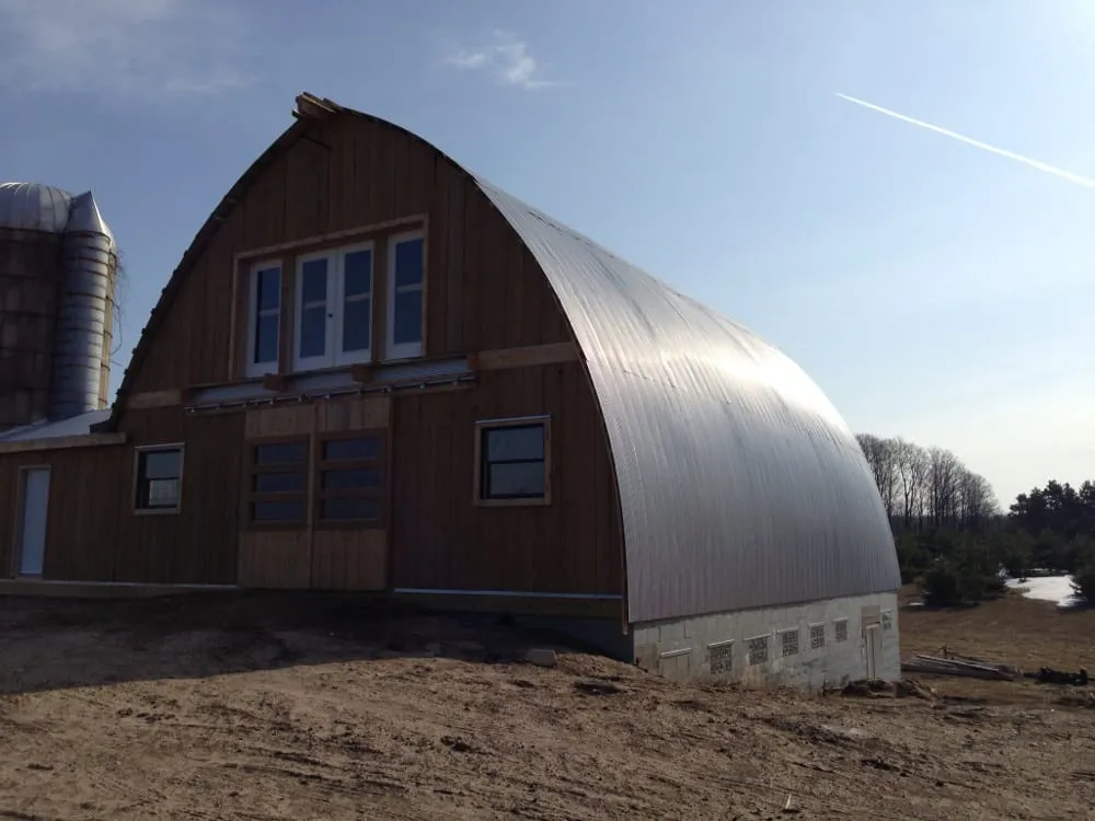 Slide of Tanbry Roofing