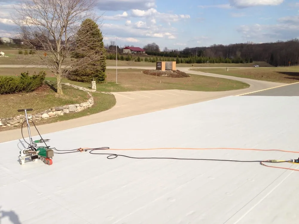 Slide of Tanbry Roofing