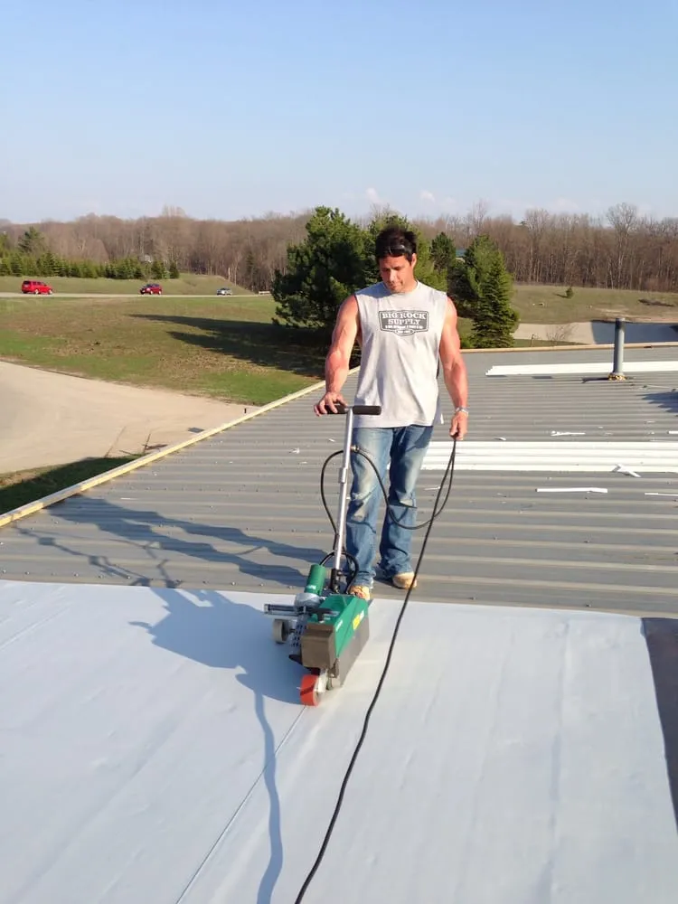 Slide of Tanbry Roofing