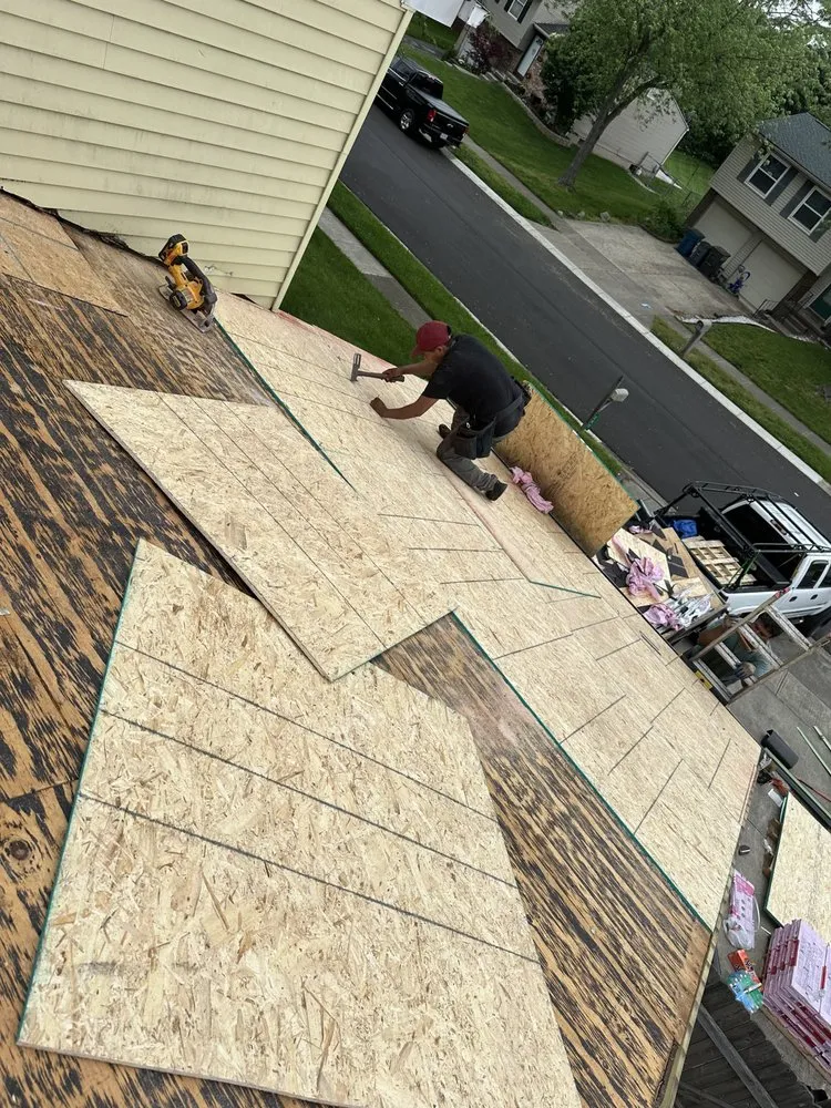 Slide of Tangeman Roofing