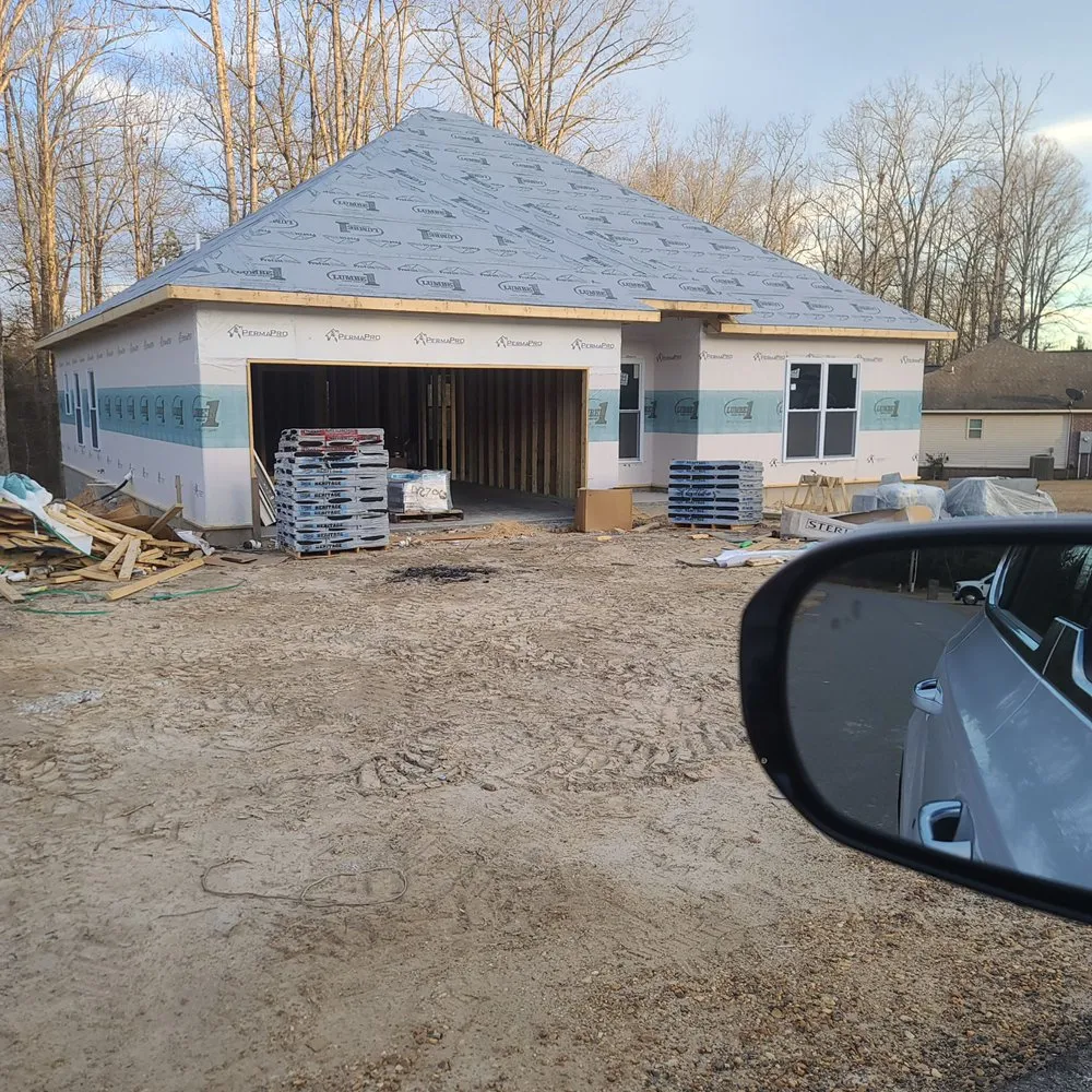 Slide of Tanners  Roofing & Restoration