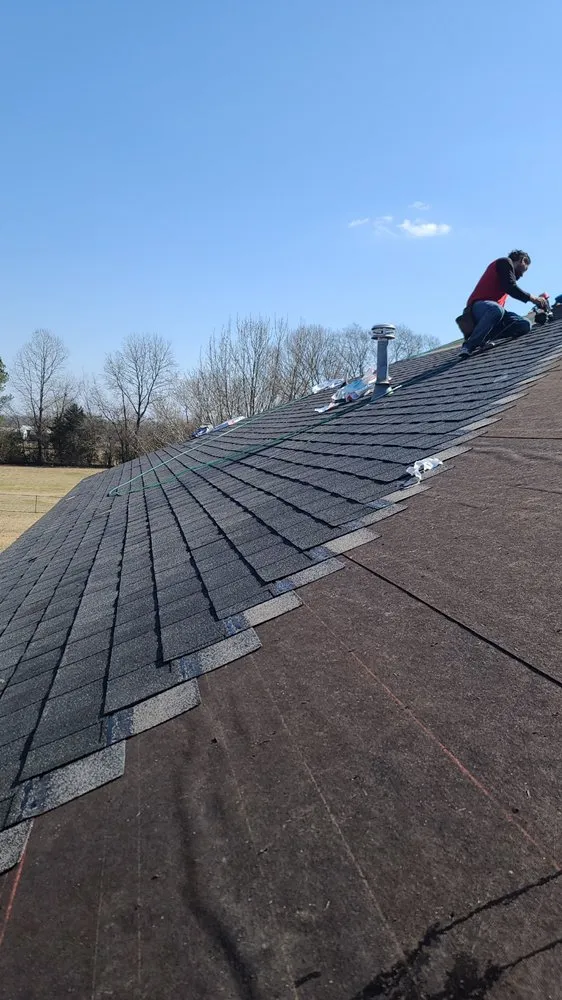 Slide of Tanners  Roofing & Restoration