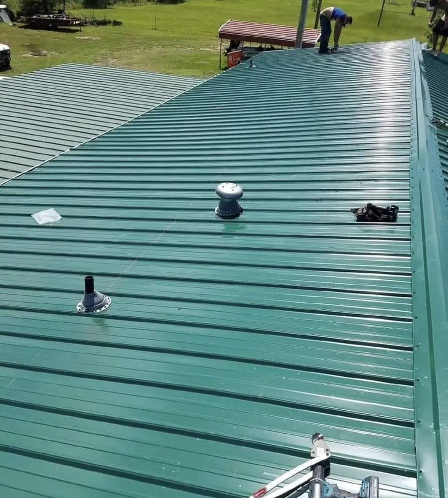 Slide of Tanners  Roofing & Restoration