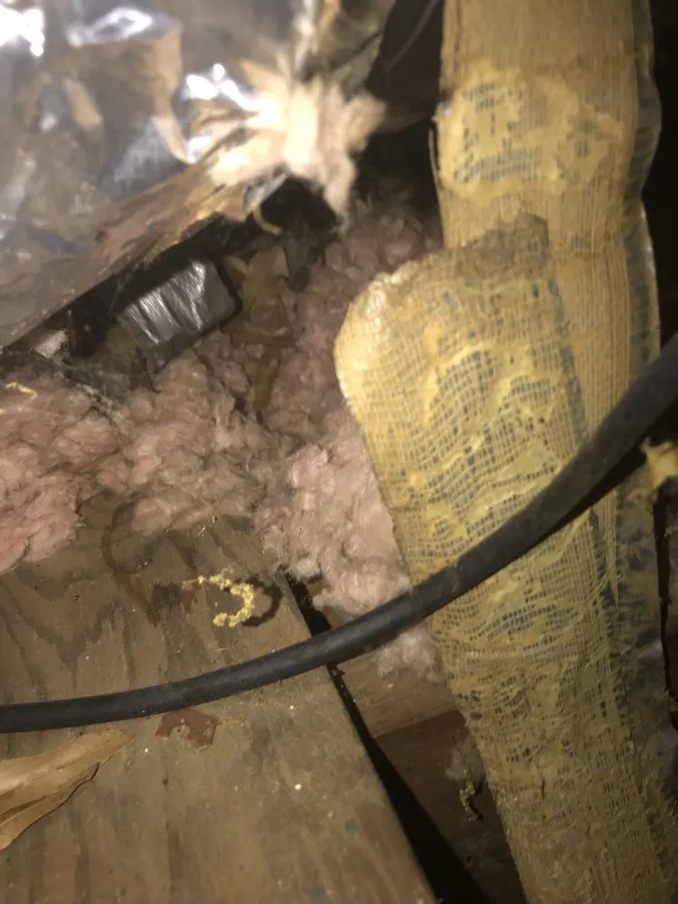 Slide of Tanner's Roofing Service