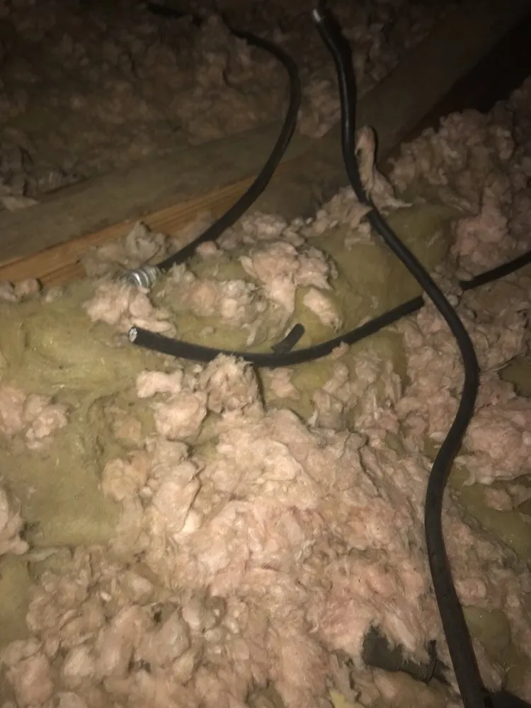 Slide of Tanner's Roofing Service