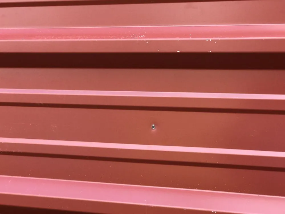 Slide of Tanner's Roofing Service