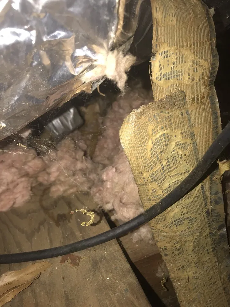 Slide of Tanner's Roofing Service