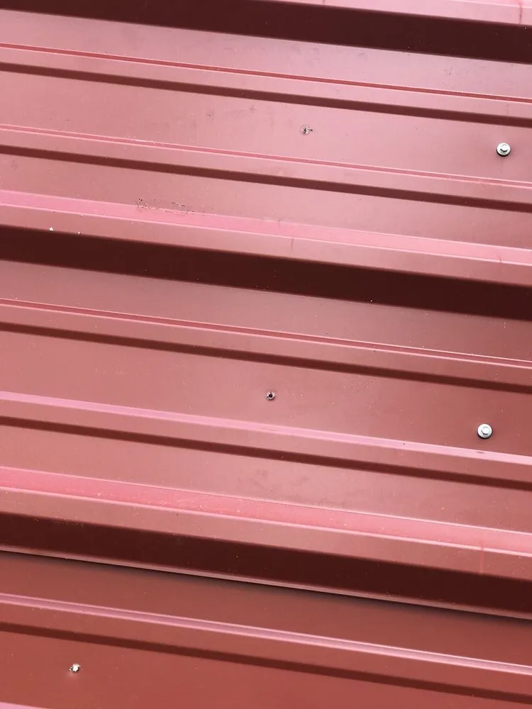 Slide of Tanner's Roofing Service