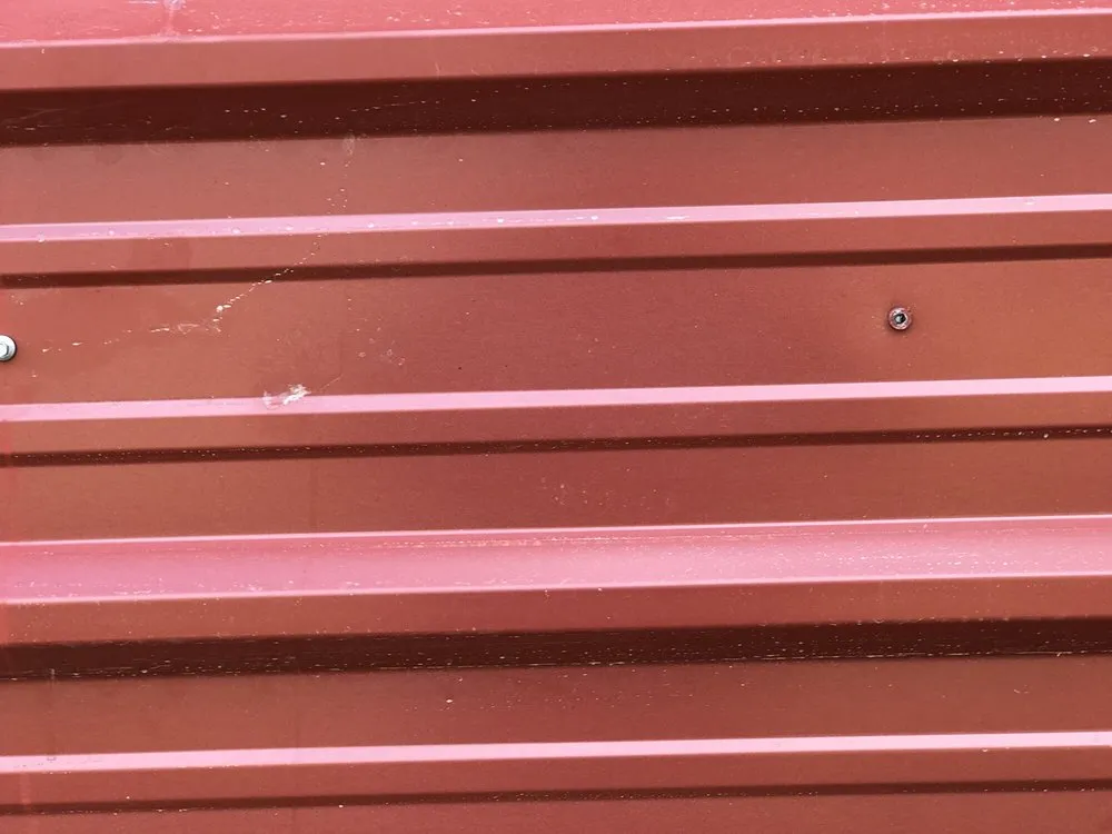 Slide of Tanner's Roofing Service