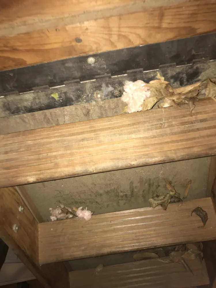 Slide of Tanner's Roofing Service