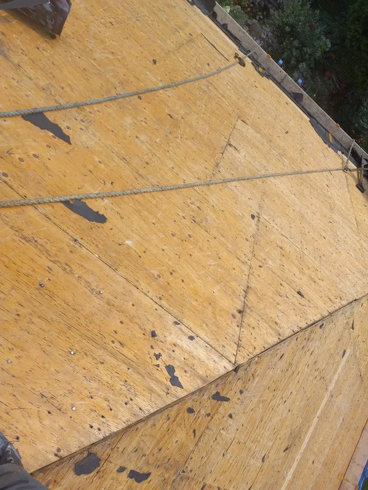 Slide of Tapia Roofing