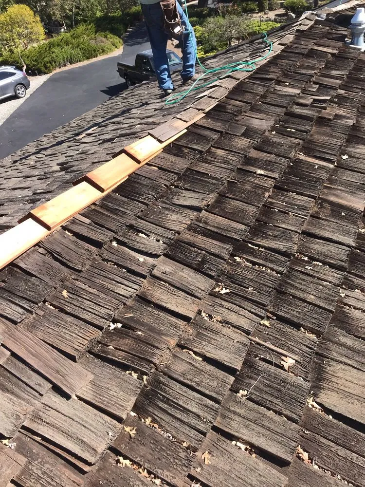 Slide of Tapia Roofing