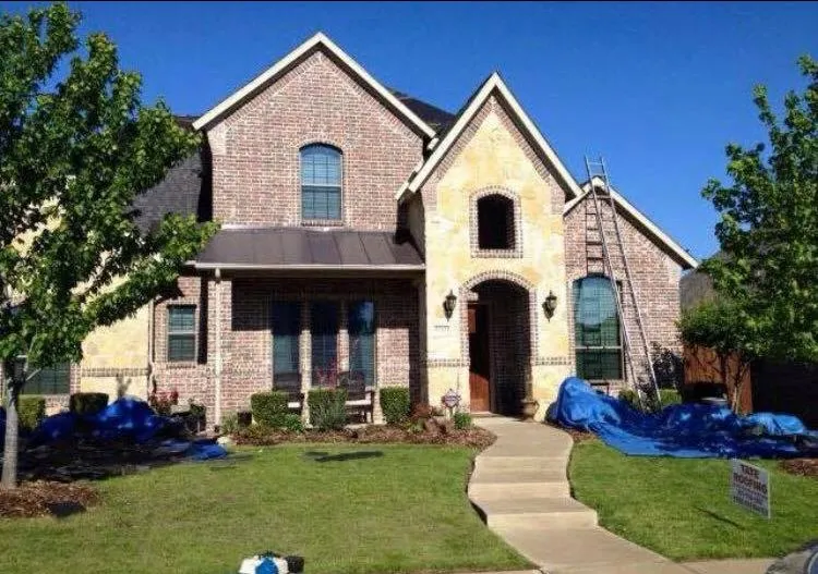 Slide of Tate Roofing