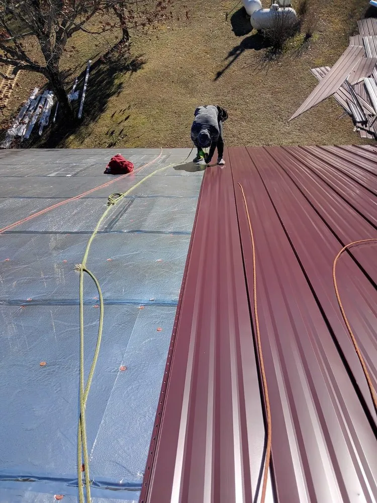 Slide of Tato's Roofing and Construction