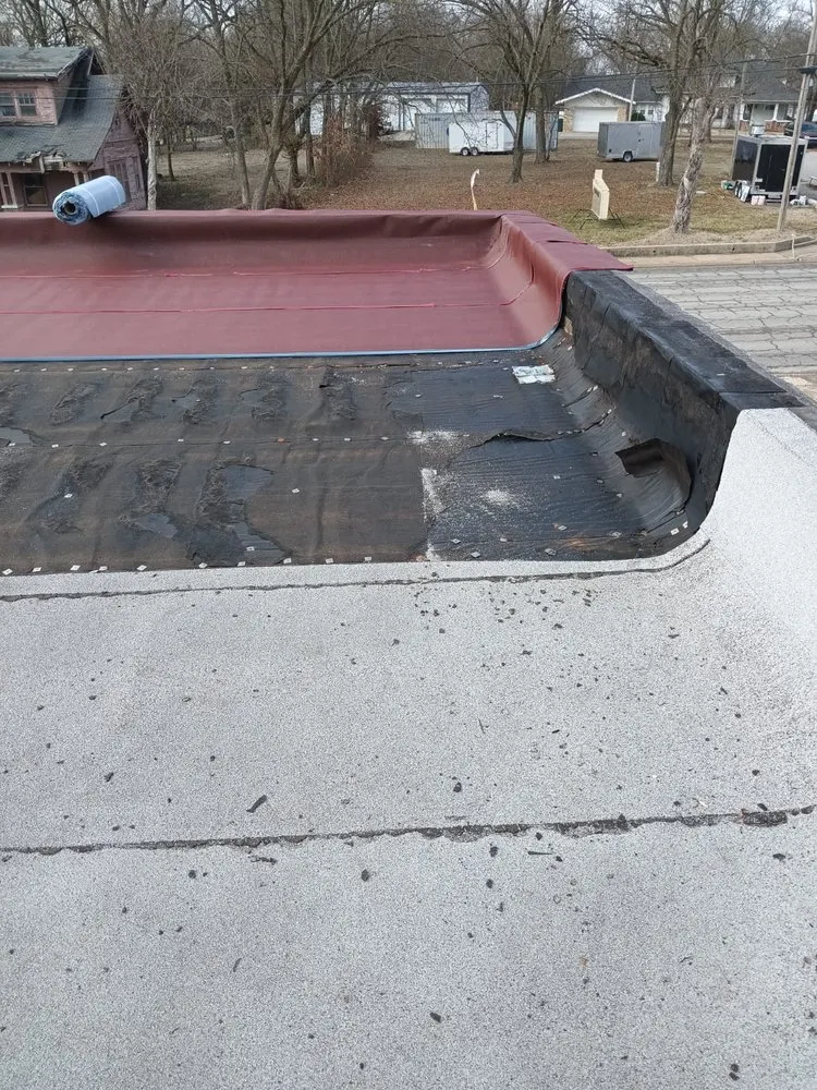 Slide of Tato's Roofing and Construction