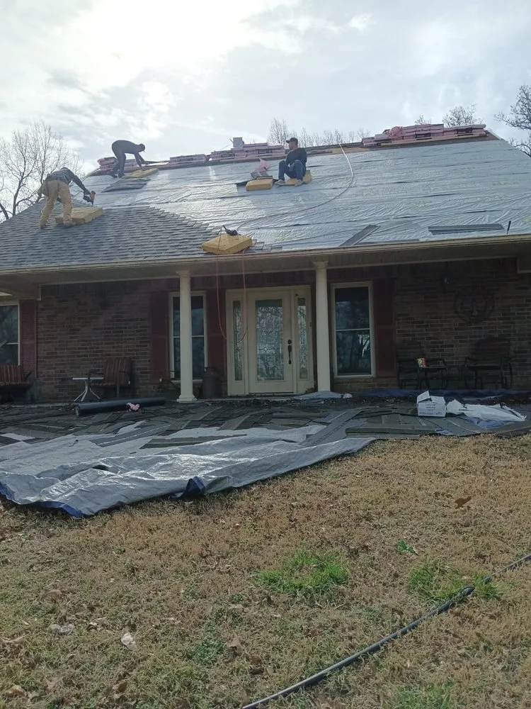 Slide of Tato's Roofing and Construction