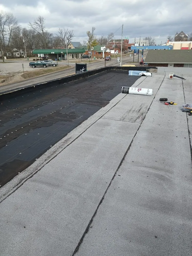 Slide of Tato's Roofing and Construction