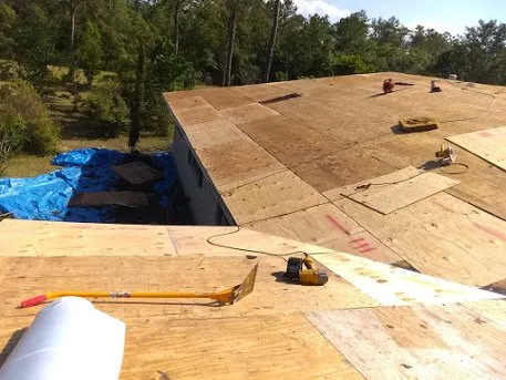 Slide of Tauros Roofing Services