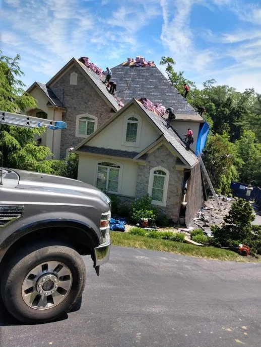 Slide of Tauros Roofing Services