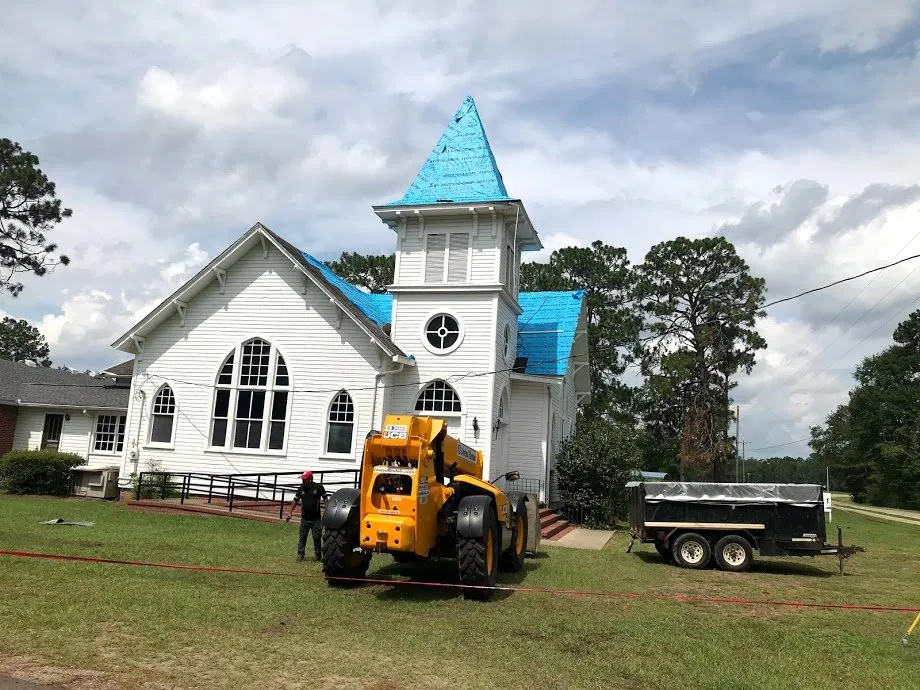 Slide of Tauros Roofing Services