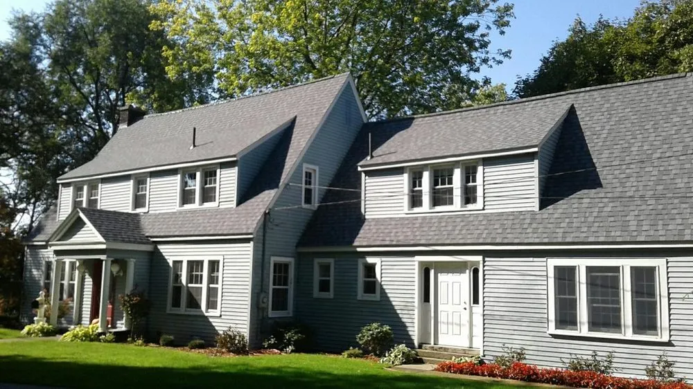 Slide of Tawas Roofing