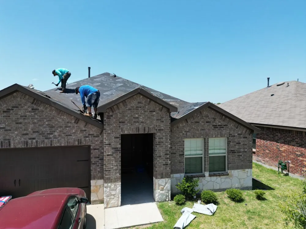 Slide of Taylored Roofing