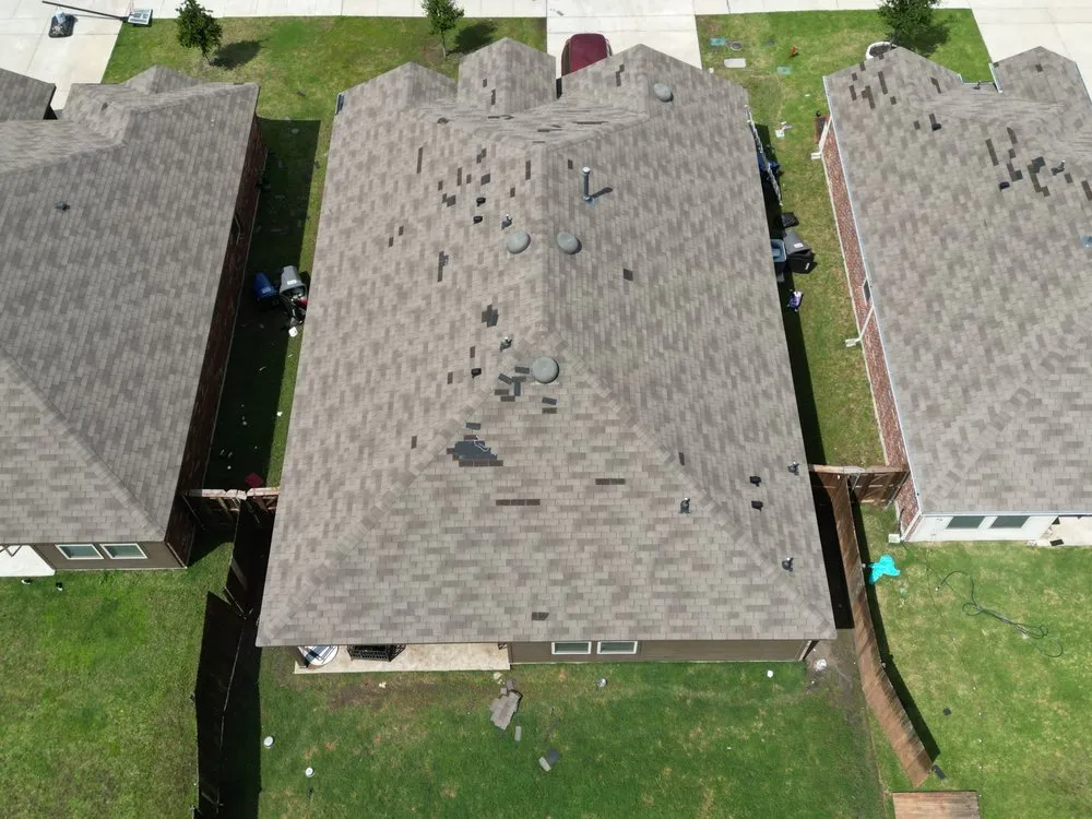 Slide of Taylored Roofing