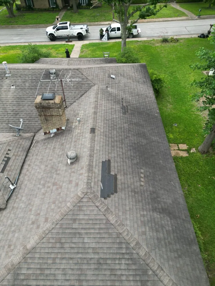 Slide of Taylored Roofing